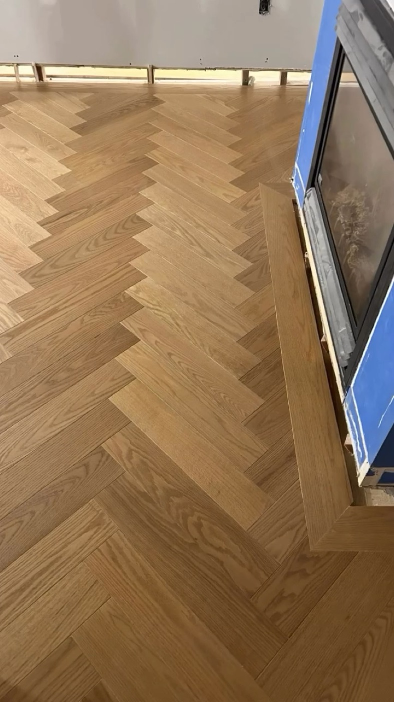 Northern wide plank hardwood flooring glue down installation in Ottawa